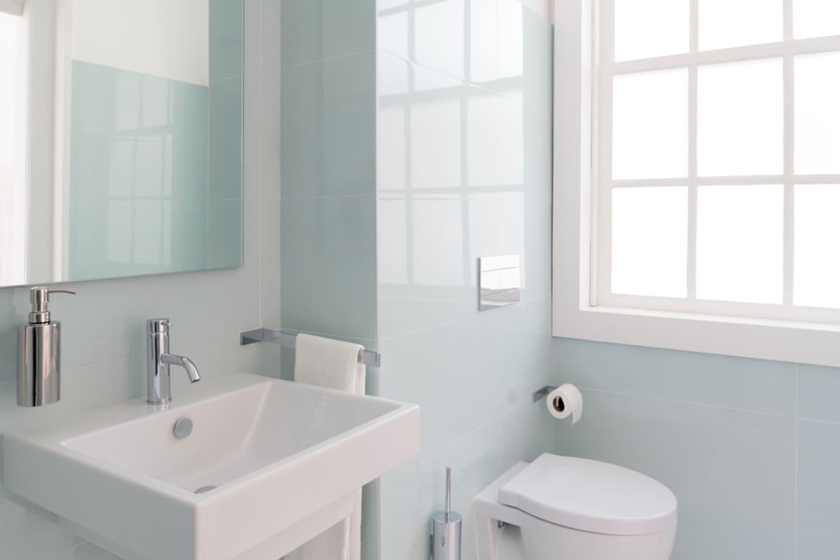 A clean, freshly-updated bathroom, Osprey Property Management upgrade recommendations concept