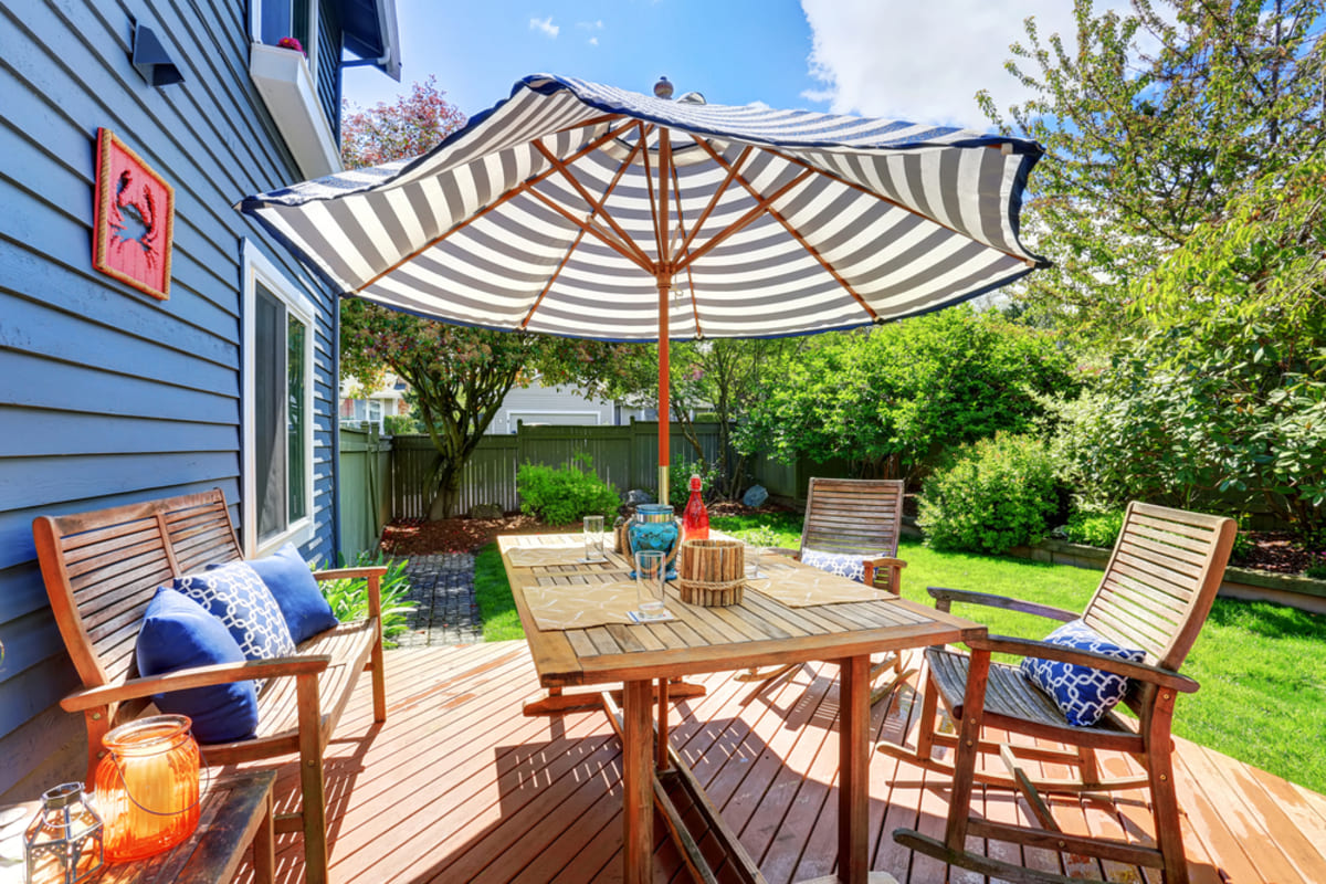 A fun and summery deck on a house patio.