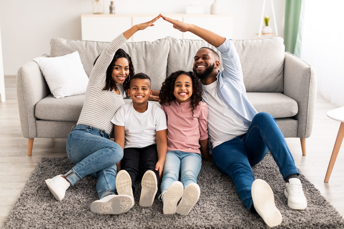 A happy family in a home, tenant onboarding concept