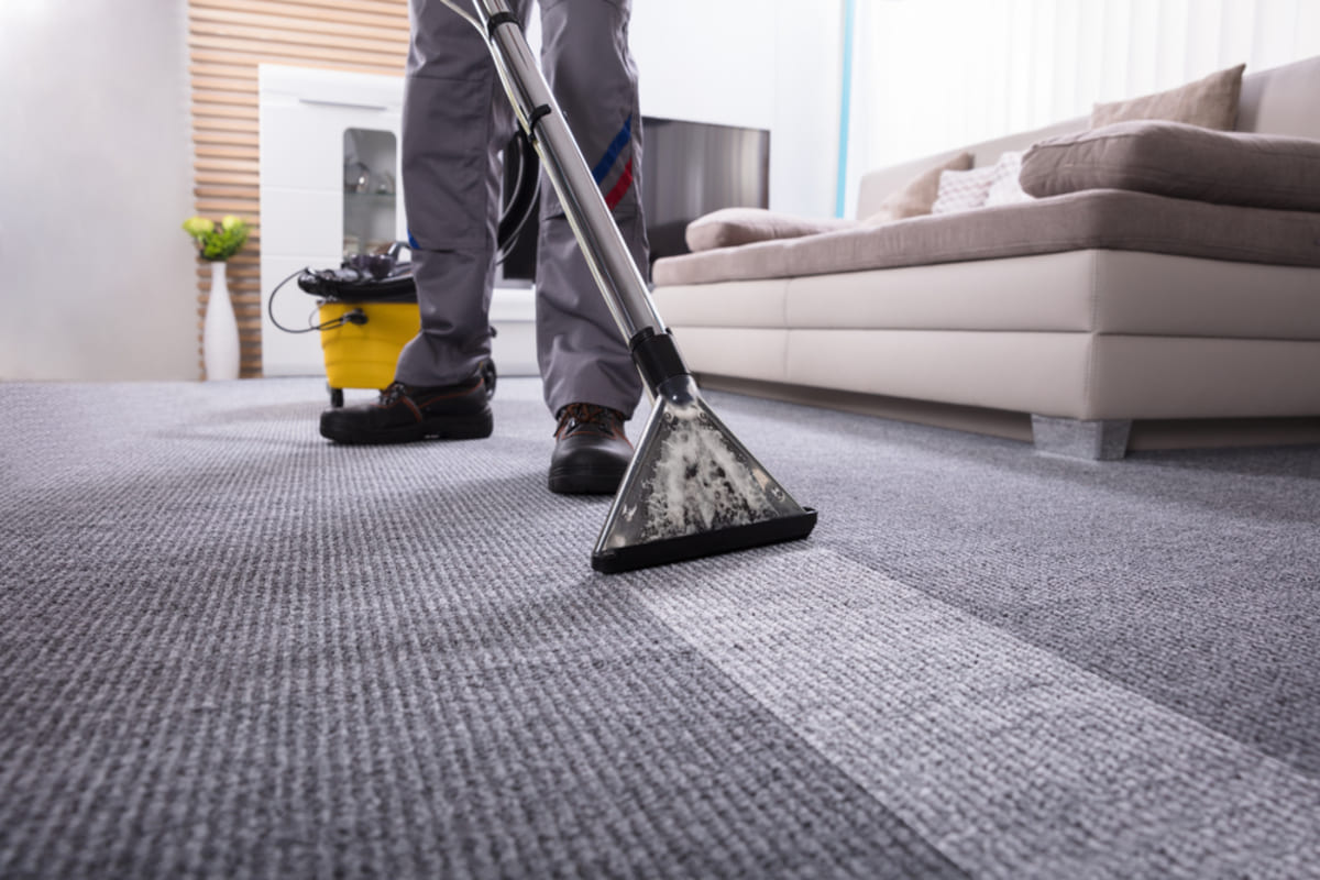 A person using a carpet cleaner, Suffolk rental property management tips to boost ROI