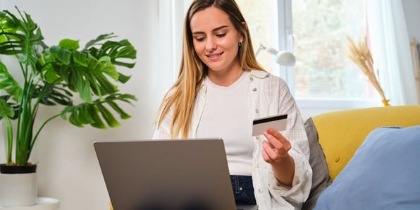 A woman paying rent online