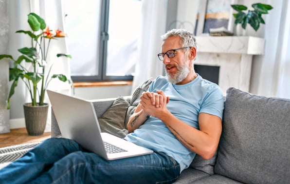 Rental property investors meets remotely with property management team