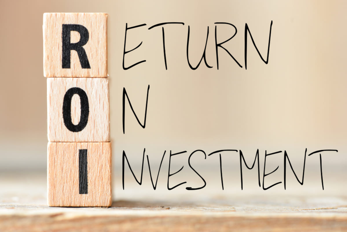 ROI spelled in block letters, property management companies help improve returns concept