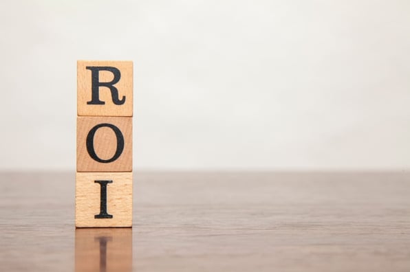 ROI spelled in wooden blocks, improve returns for real estate investor Virginia Beach concept