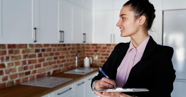 Female landlord conducts an evaluation of a rental property
