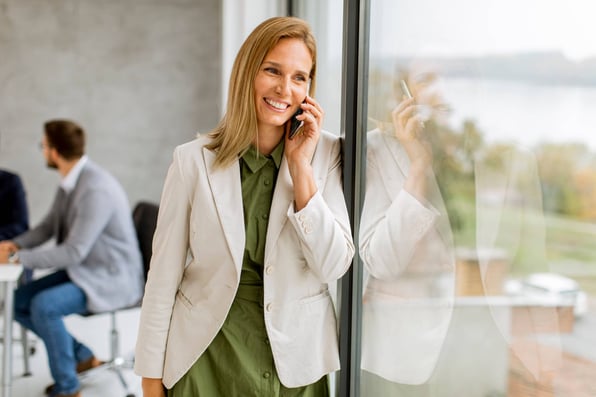Female Norfolk landlord on the phone with a rental property tenant