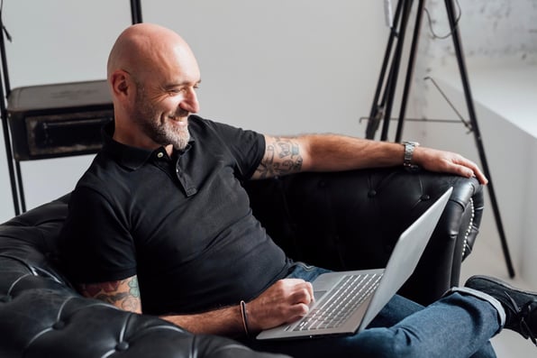 Remote landlord having conversation via laptop with Hampton Road property manager