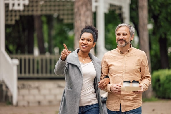 Man and woman touring local Hampton Roads neighborhood