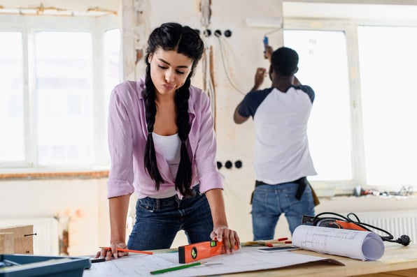 Female landlord working on rental home maintenance project