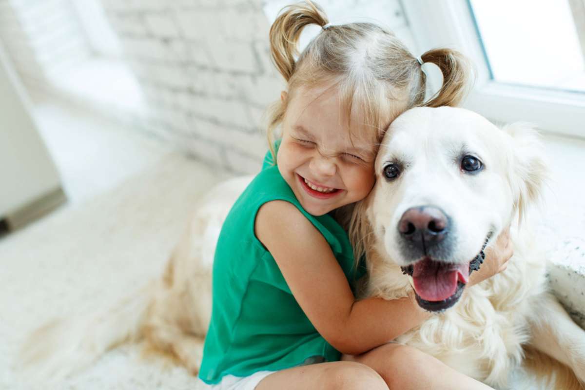 A child with a dog