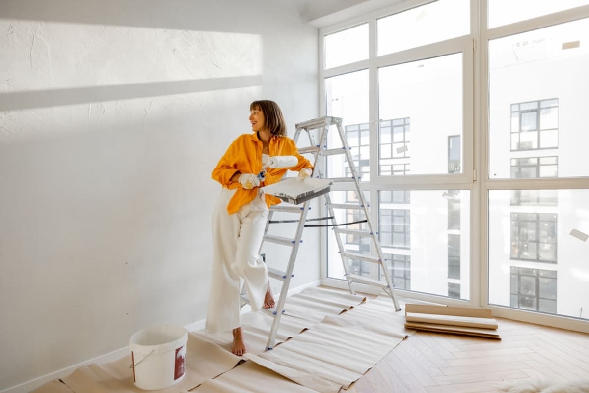 Landlord painting the walls of a rental property
